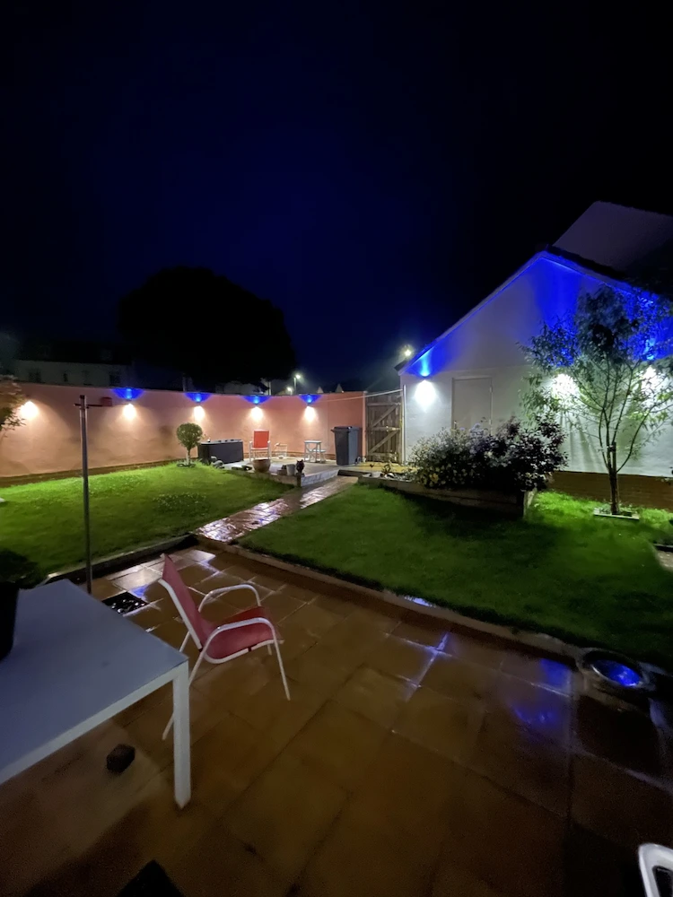 Large garden area with ceiling lights and ceiling spotlights in blue and warm white