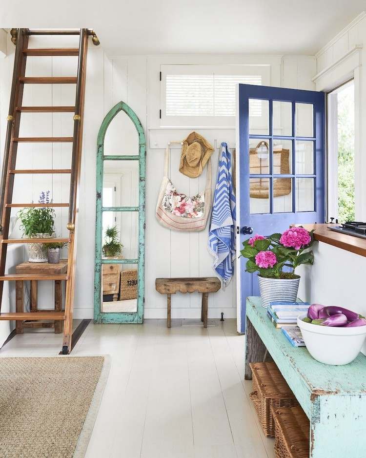 Set up a vintage hallway and use an old window as a mirror