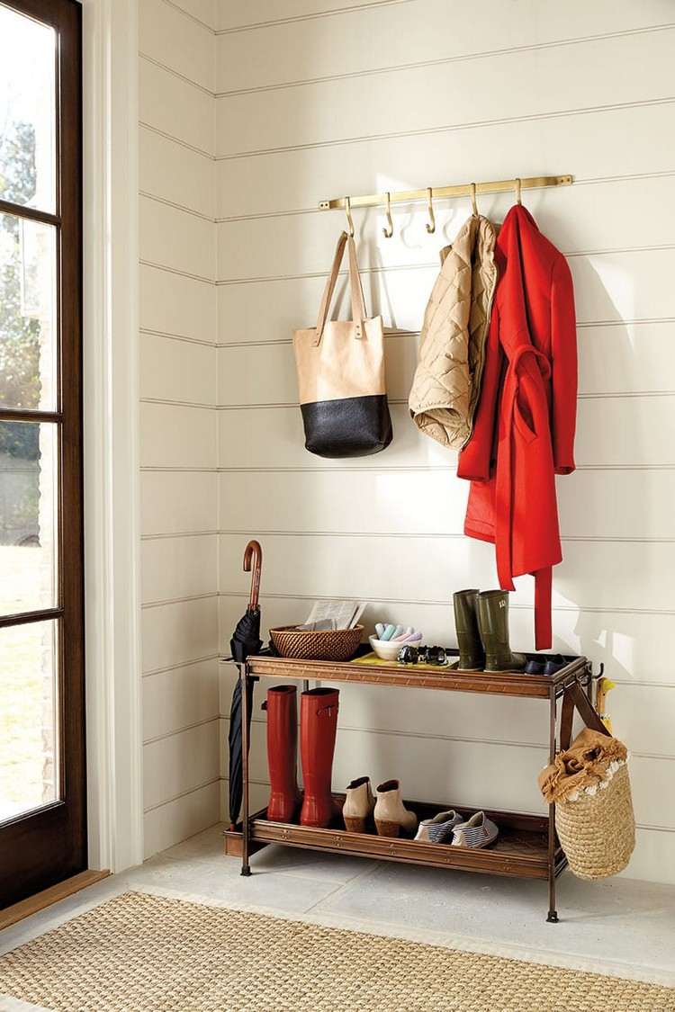 Design a vintage hallway with a side table instead of a shoe cabinet and a bronze coat hook