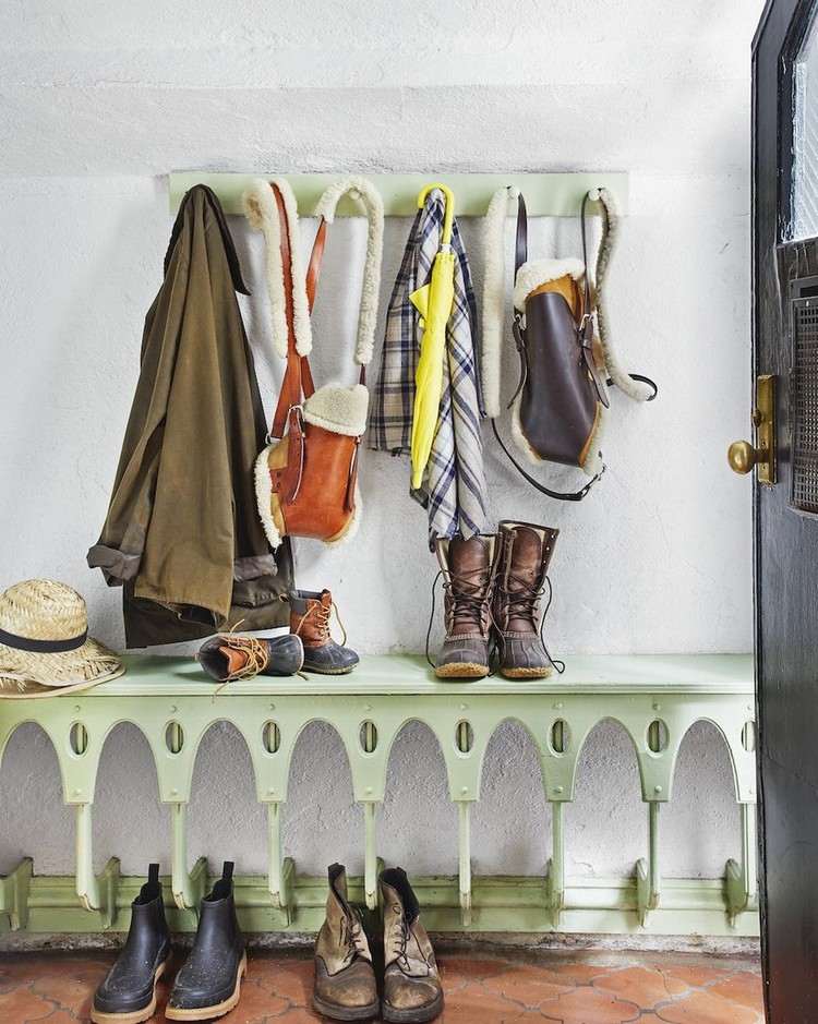 Set up a vintage style hallway design with old furniture