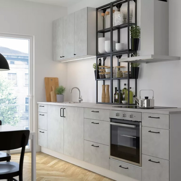 Choose neutral grays for kitchen cabinets and add stylish contrasting door handles