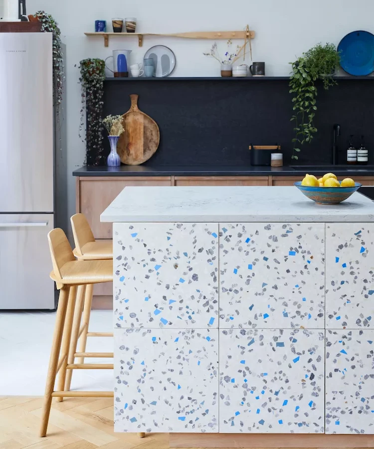 Use foil or wallpaper to beautify unsightly surfaces in kitchens or living rooms at low cost