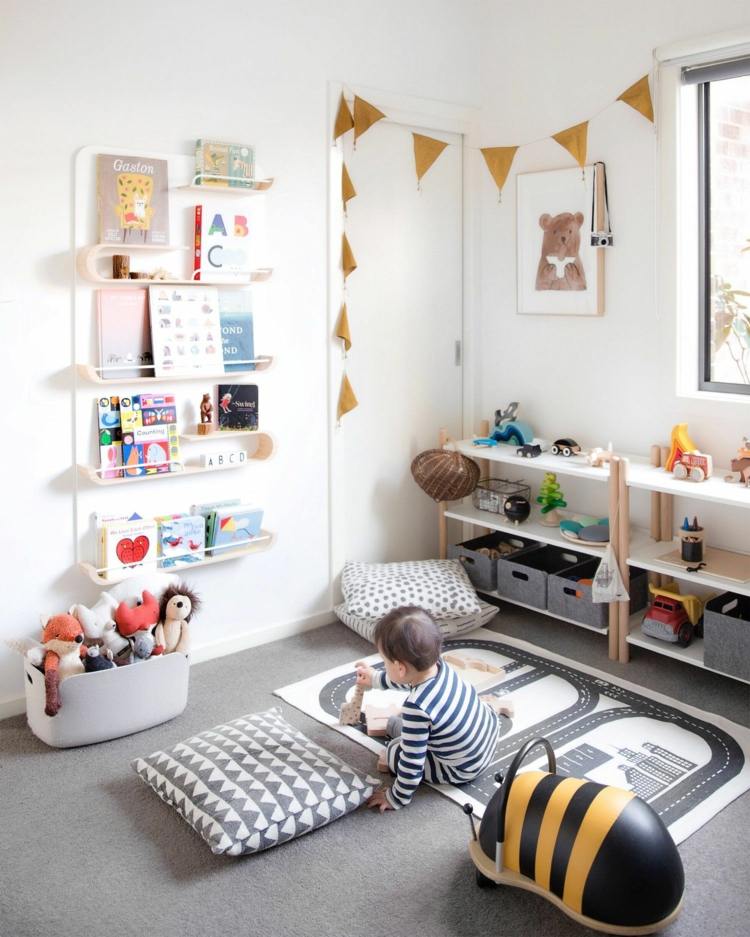 Montessori children's room with play area for toddlers open shelves