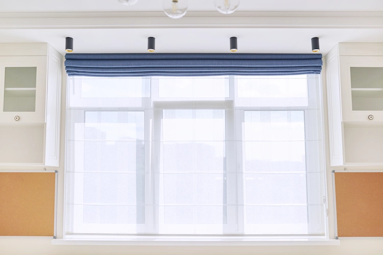 Insulate windows with various insulation materials such as thermal curtains or roller blinds and window film or sealing tape