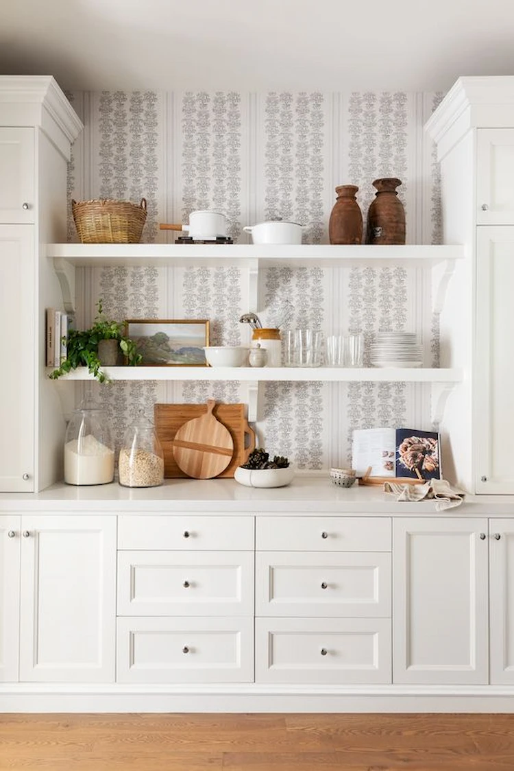 Use wallpaper to spruce up the back of cupboards and improve the atmosphere in your living space